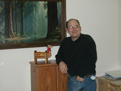 [Photo 1: Scott in his new apartment]