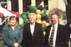 [Photo 3: Mayor Bud Asher, Florence Welch and Dan Abel at a ribbon-cutting. ]