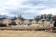 [Photo 4: Homes that will be moved and sold to Indian Tribes]