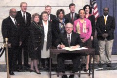 [Photo 1: Governor Paul Patton signed a proclamation declaring April as Fair Housing Month]