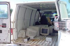 [Photo 1: Computers will be used by Tutorville, C.A.R.E.'s after-school and summer program.]