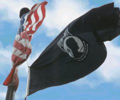 [Photo 1: American Flag and the POW-MIA Flag]
