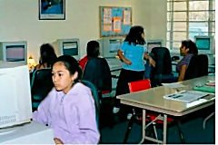 [Neighborhood Networks children are learning on new computers]