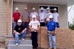 [Photo 4: The Lincoln Public School students during home construction]