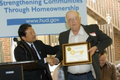 [Photo 2: Symbolic keys presented to three Colorado families who are becoming first-time homebuyers through HUD's Section 8 Homeownership Initiative.]