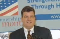 [Photo 3: HUD Regional Director John Carson praised the families and this special HUD homeownership program.]