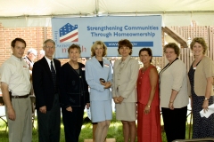 [Photo 4: Members of the local housing agencies and other partners have made the homeownership effort successful.]