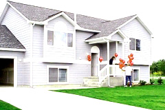 [Photo 2: A new home at Slocum Ridge Housing Development]