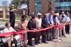 [Photo 1: Ribbon cutting ceremony for the new townhomes at Carver Park]