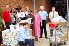 [Photo 1: HUD representatives sponsored a "School Tools" competition.]
