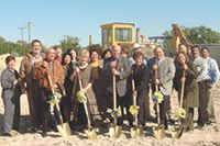 [Photo 1: Officials with shovels in hand ready to break ground]