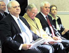 [Photo: Officials listen to opening remarks from CHA Director Don Alexander]