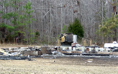 [Photo 2: The charred remains of the Morning Star Missionary Baptist Church]