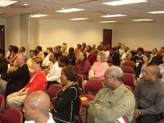 [Photo 3: Hud Employees in Town Hall Meeting]