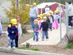 [Photo 2: Groundbreaking crew]