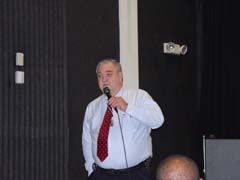 [Photo 2:  Larry Gispert openning the session]