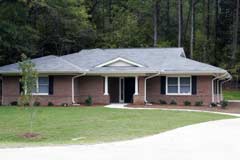 [Photo 1: Jared House Front View]