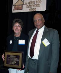 [Photo: Sandra Devlin presented with the Charles M. Hill, Sr. award]