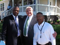 [Photo 1: (left to right) Pastor David Walker, Mark Brezina, and Larry Wright]