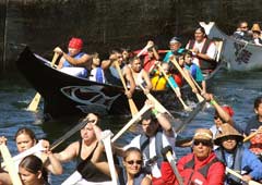 [Photo 1: Tribal Canoe Journey participants in their canoes]
