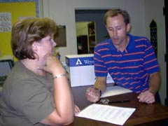 [Photo 1: Elliott Dassow and Pam Greer]