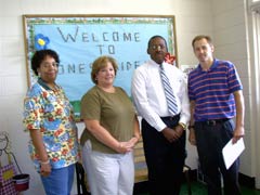 [Photo 2: (L to R) Beverly Bell, Pam Greer, Bill Dirl, Elliott Dassow]
