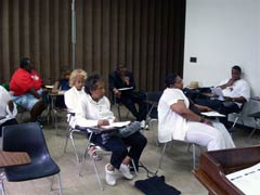 [Photo 2: "HUD At A Glance" presentation]