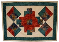 [Photo 2: Group quilt]