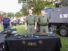 [Photo 2: SWAT Team Booth]