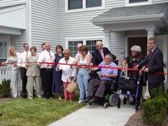 [Photo: Ribbon cutting ceremony for Bausman Street Independent Living]