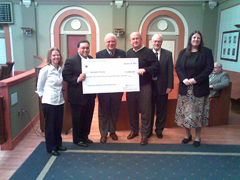 [Photo 1: RD Joe Galvan presents check to Kenosha County Executive and Racine Mayor]