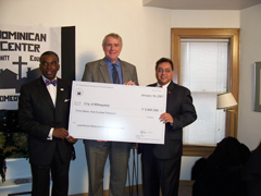 [Photo 2: RD Joe Galvan presents check to Milwaukee Mayor and Health Commissioner]