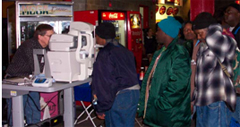 [Photo 3: Providing services to the homeless]