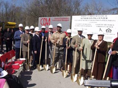 [Photo 2: Groundbreaking participants]