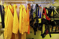 [Photo 2: Coats and harnesses]