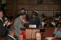 [Photo 3: Harold Cole is presented a ceremonial key to the City of Birmingham by Mayor Bernard Kincaid]