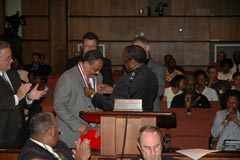 [Photo 3: Harold Cole is presented a ceremonial key to the City of Birmingham by Mayor Bernard Kincaid]