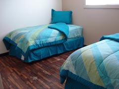 [Photo 2: Beds in unit]