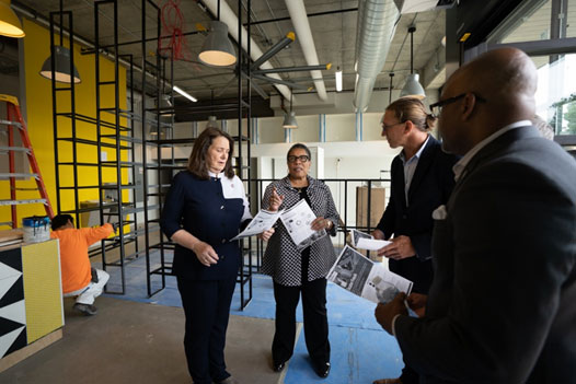 [Secretary Marcia L. Fudge visiting a construction site in Denver's Sun Valley neighborhood in Denver, Colorado. Pictured with U.S. Representative Diana DeGette (CO-01)(left) and Denver Housing Authority Chief Real Estate Officer Ryan Tobin (right).]