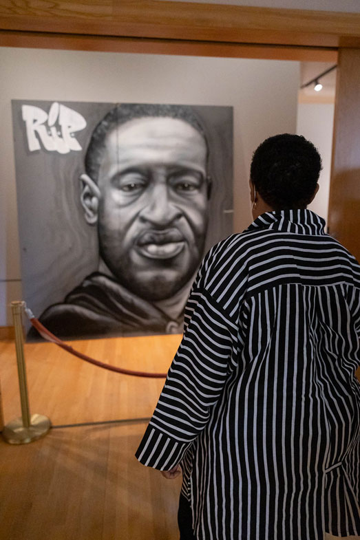 [Secretary Marcia L. Fudge views a piece of street art remembering the life of George Floyd during a visit to the Birmingham Civil Rights Institute.]