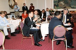 Photo of public interest group executives during Symposium session.