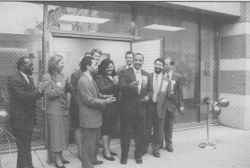 Photo of Mayor Douglas Palmer and others at grand opening and ribbon cutting