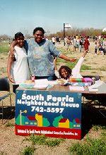 Photo of graduate counseling intern at a community outreach function