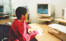 Photo of child using a computer