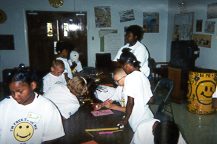 Kids Club members write goals during after-school activity