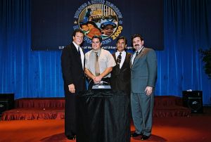 Photo of recipients receiving award from Secretary Cuomo & Deputy Secretary Ramirez