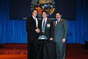 Photo of Stephen Nocilla receiving award from Secretary Cuomo & Deputy Secretary Ramirez