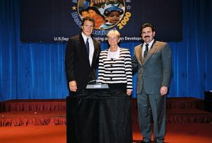 Photo of Carol Bower receiving Best of the Best award