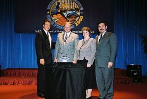 Photo of David Clark & Catherine Fitch receiving award from Secretary Cuomo & Deputy Secretary Ramirez