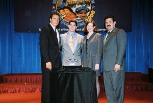 Photo of Craig Harrick & Cindy Vartch receiving award from Secretary Cuomo & Deputy Secretary Ramirez